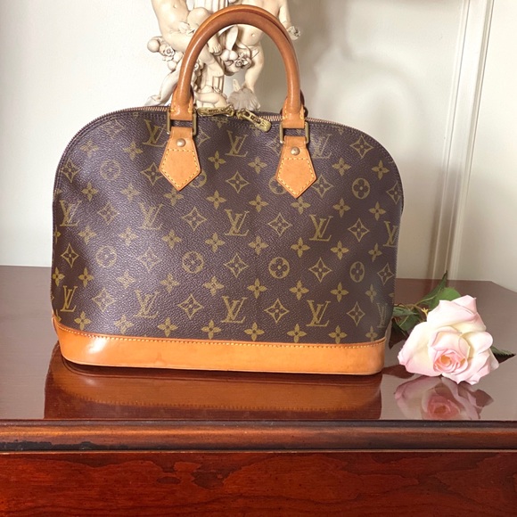 Louis Vuitton Handbags - Louis Vuitton Alma Monogram Leather Bag.